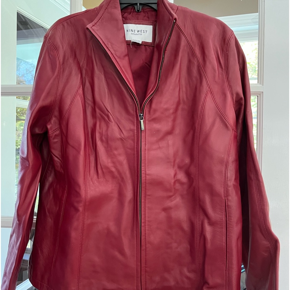 Nine West used leather jacket. Shell 100% leather and linning 100% polyester